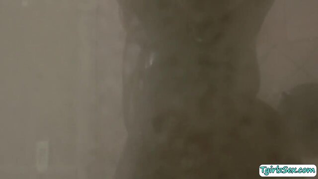 Voluptuous ebony trans woman gives sensual blowjob