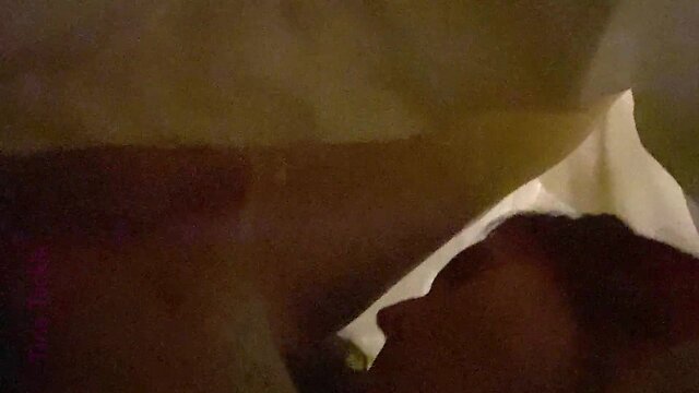 Receiving oral pleasure under the covers