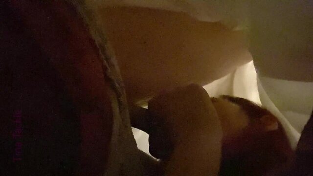 Receiving oral pleasure under the covers