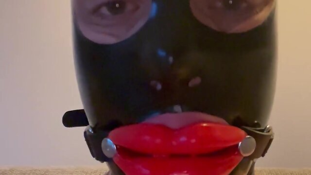Fetish latex doll sissy femboy with lip gag and mask drools - a touching experience