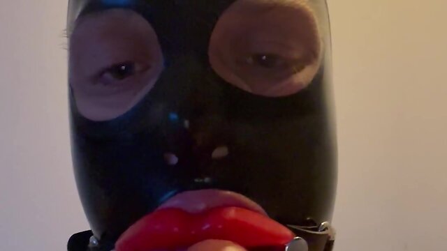 Fetish latex doll sissy femboy with lip gag and mask drools - a touching experience