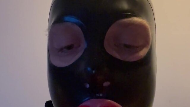 Fetish latex doll sissy femboy with lip gag and mask drools - a touching experience