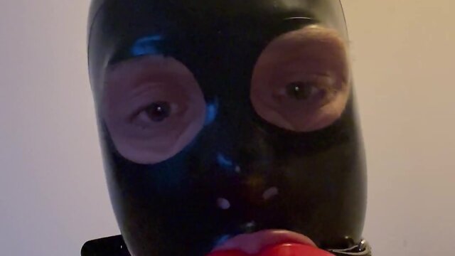 Fetish latex doll sissy femboy with lip gag and mask drools - a touching experience
