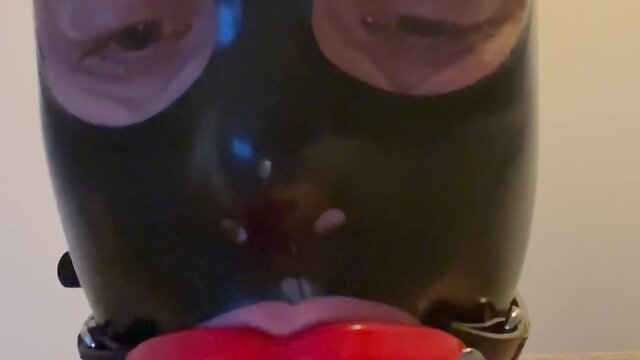Fetish latex doll sissy femboy with lip gag and mask drools - a touching experience