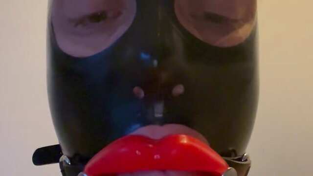 Fetish latex doll sissy femboy with lip gag and mask drools - a touching experience