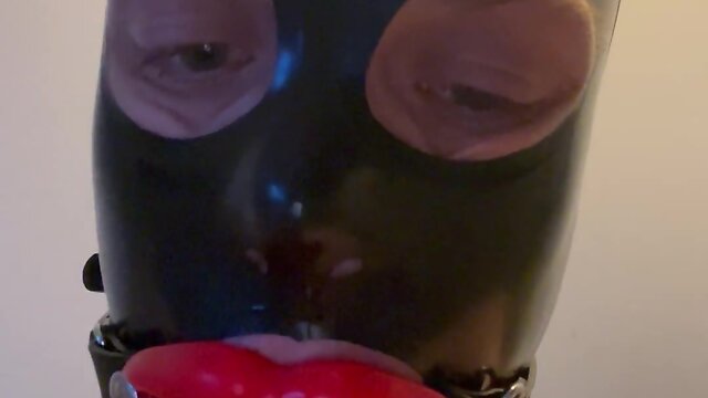 Fetish latex doll sissy femboy with lip gag and mask drools - a touching experience