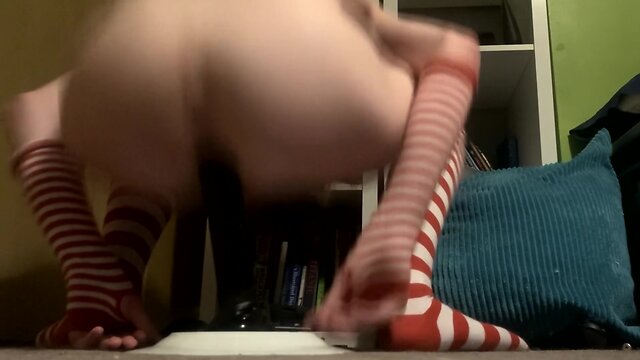 Close call: sissy riding a big black dildo almost gets caught!