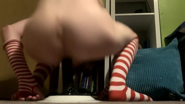 Close call: sissy riding a big black dildo almost gets caught!