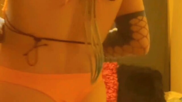 Fun times on my bed in my orange workout outfit - love the way it accentuates my booty!