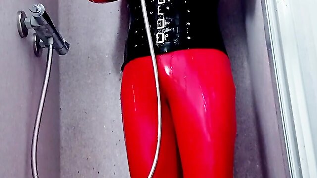 Rubberdoll enjoys shower enema and fingers her asshole