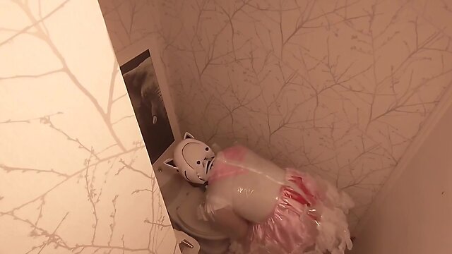 Chibi moon: cleaning the bathroom in her maid outfit with a clear pvc helmet