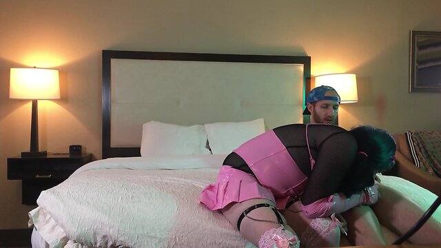 Transgender woman in chastity performs oral sex