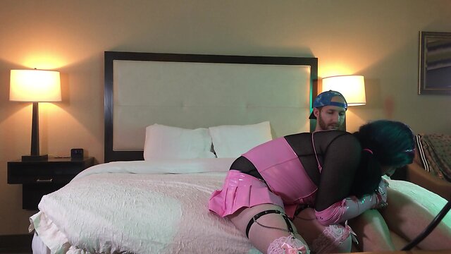 Transgender woman in chastity performs oral sex