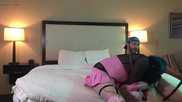 Transgender woman in chastity performs oral sex