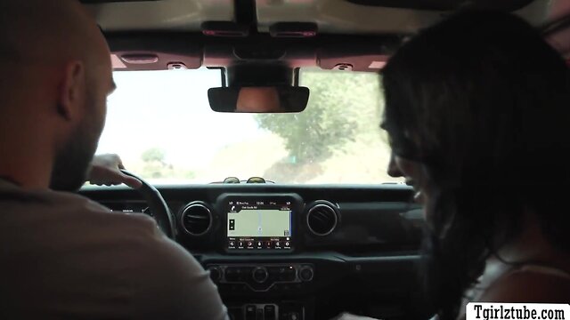 Big ass TS hitchhiker gets a free ride from driver in nowhere