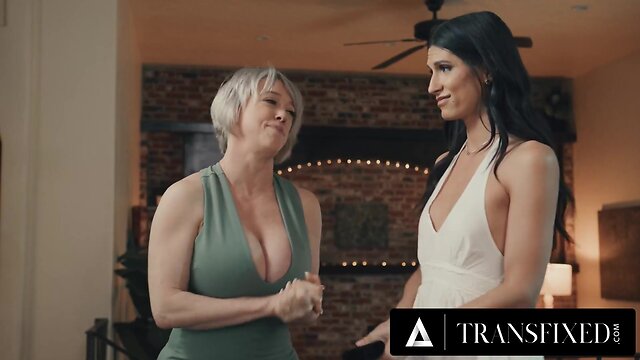 Hot trans performer Zariah Aura gets fucked hard by busty MILF Dee Williams in a steamy lesson