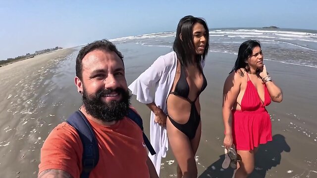 Tranny Baianinha gets banged on the beach by couple