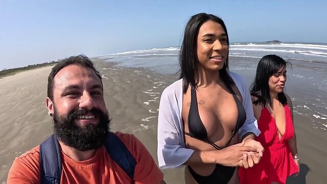 Tranny Baianinha gets banged on the beach by couple