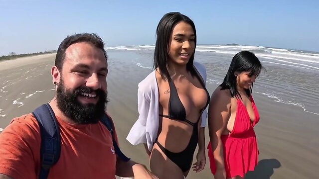Tranny Baianinha gets banged on the beach by couple
