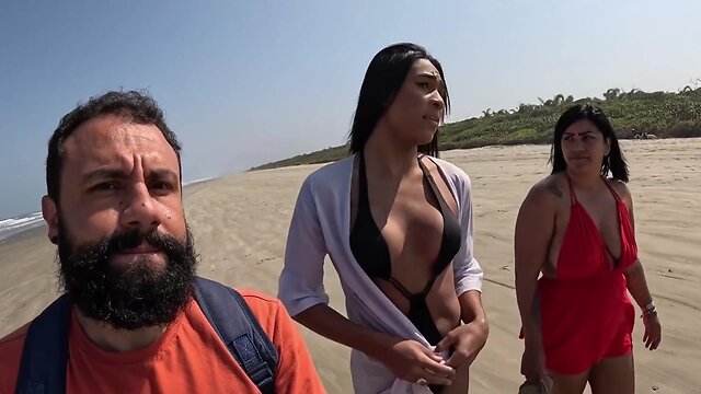 Tranny Baianinha gets banged on the beach by couple