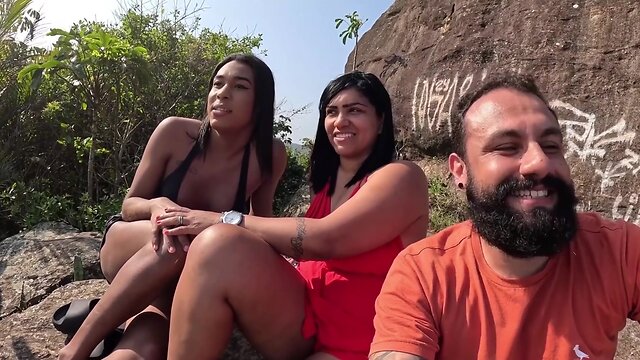 Tranny Baianinha gets banged on the beach by couple