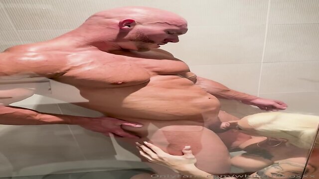 A mature woman has sex in the shower with a young man