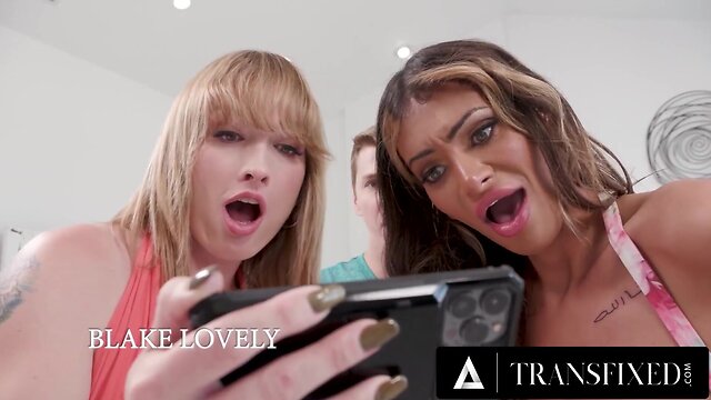 Two hot trans performers seduce a guy, leading to intense double anal action