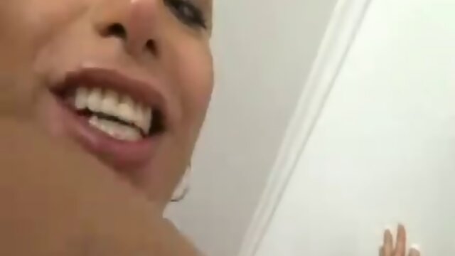 Blonde Shemale in red Latex  solo