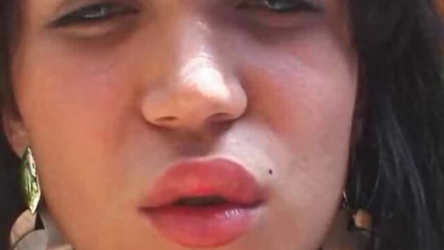 Cute brunette t-girl plays with a sex toy