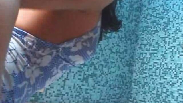 Cute brunette t-girl plays with a sex toy