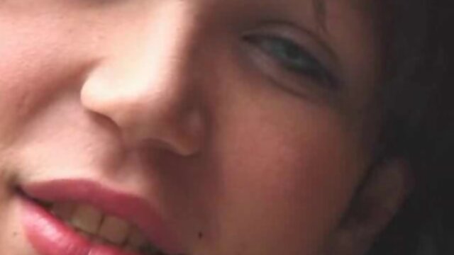 Cute brunette t-girl plays with a sex toy