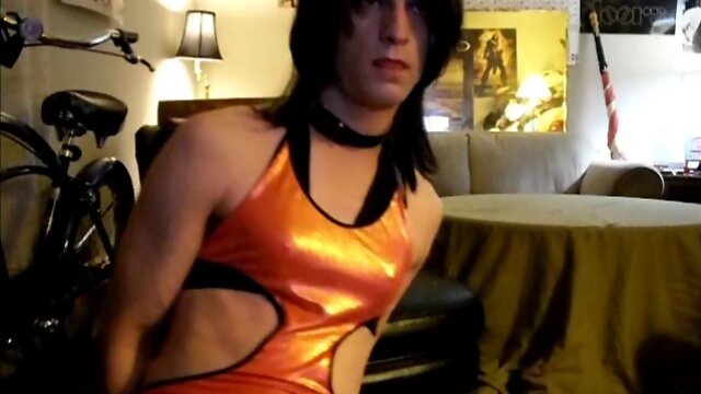 Nasty crossdresser in latex dildoing himself