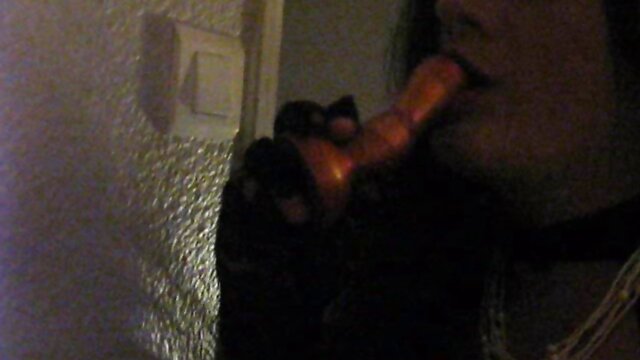 Slutty tranny in black strokes and fucks herself