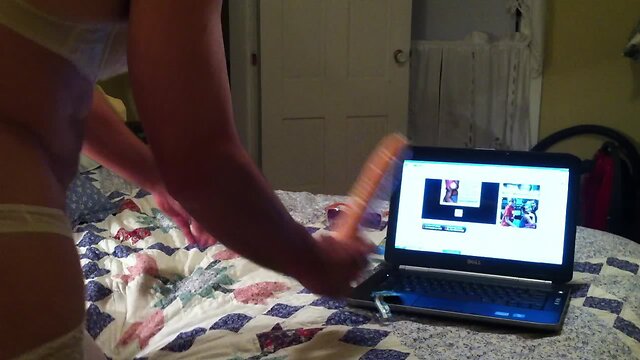 Nasty crossdresser dildoing himself furiously