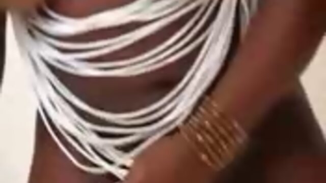 Voluptuous black tranny shows off