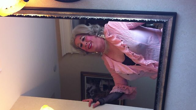 Crossdresser in front of the mirror