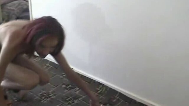 Slim tranny with small tits enjoys a solo