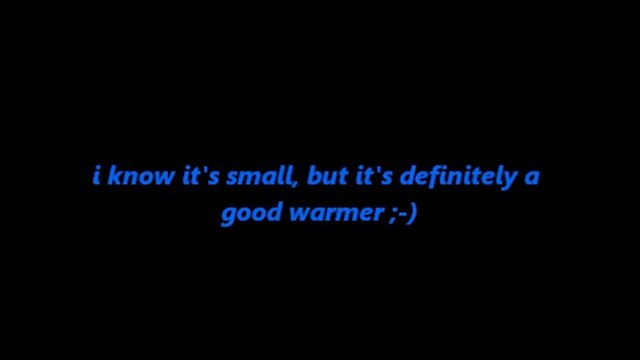 Alexandra playing with a little blue toy